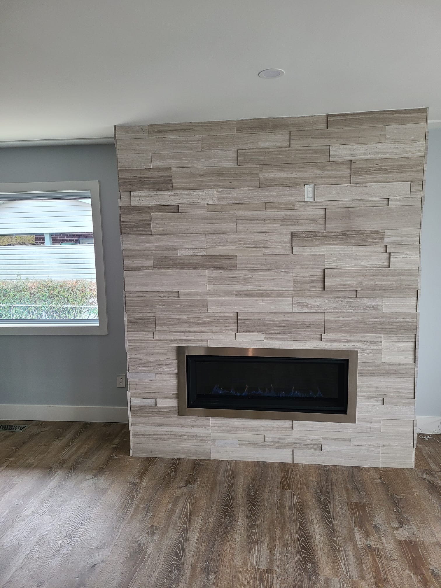 Modern stone fireplace installation